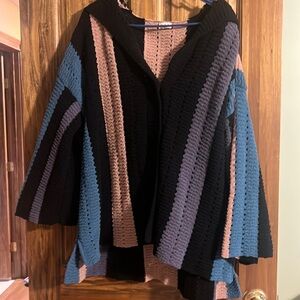 Cape like sweater